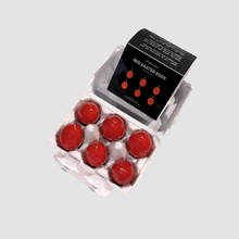 Load image into Gallery viewer, HALF DOZEN RED EASTER EGG CANDLES [+ GLASS EGG CUP]
